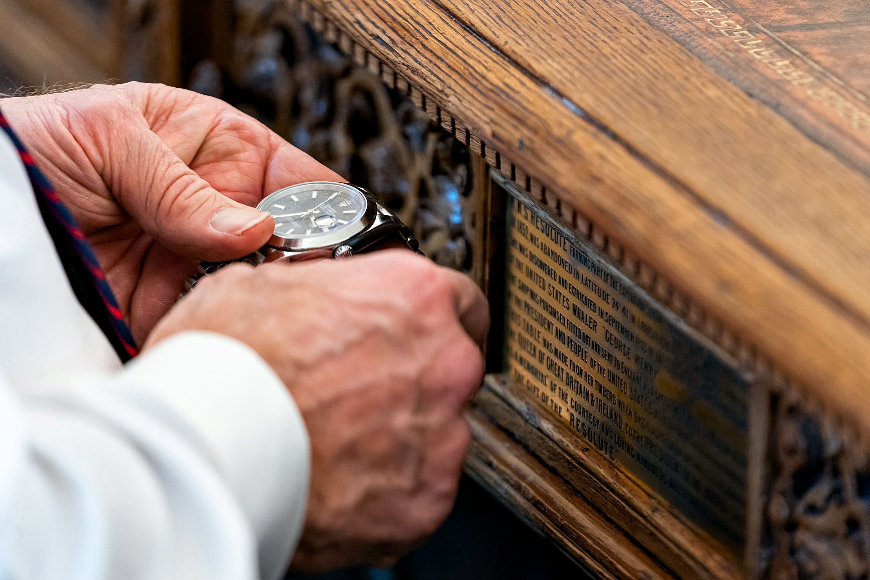 Luxury wristwatch being examined for valuation